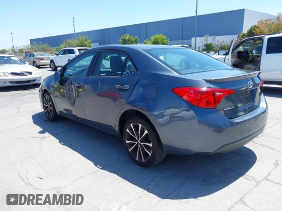 2017 Toyota Corolla L with VIN 5YFBURHE6HP575352, listed as a IAAI auction lot 42417810 with 248,626 mi miles and . Bid and sale history available at DreamBid. Image 3.
