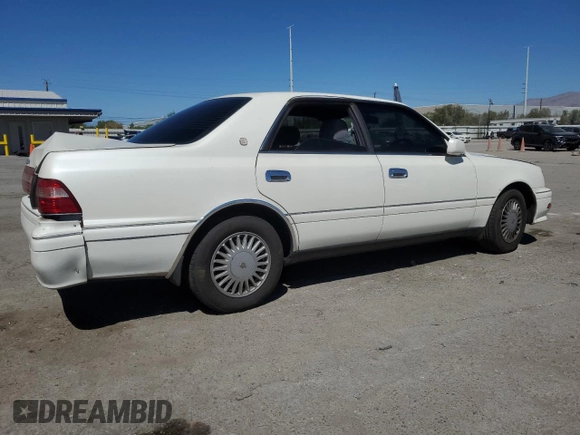 1996 Toyota Crown z VIN JZS1550042389, wystawiony jako Copart lot #68698234 z przebiegiem 117 283 mil mil oraz Szkoda całkowita • Salvage title. Historia ofert i sprzedaży dostępna na DreamBid. Obrazek 3.
