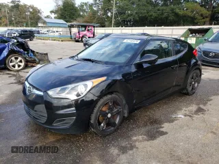 2012 Hyundai Veloster w/Red Int with VIN KMHTC6ADXCU063897, listed as a Copart auction lot 82100474 with 191,493 mi miles and Salvage title. Bid and sale history available at DreamBid. Image 1.