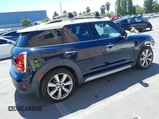 2017 MINI Countryman Cooper S z VIN WMZYT3C39H3D97769, wystawiony jako IAAI lot #42794779 z przebiegiem 126 880 mil mil oraz . Historia ofert i sprzedaży dostępna na DreamBid. Obrazek 4.