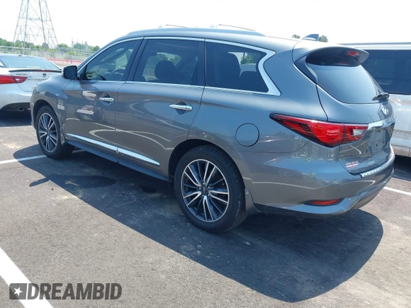 2019 Infiniti QX60 Pure with VIN 5N1DL0MN7KC563655, listed as a IAAI auction lot 42469111 with 84,864 mi miles and . Bid and sale history available at DreamBid. Image 3.