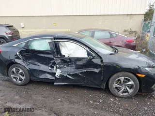 2019 Honda Civic Sedan LX with VIN 2HGFC2F60KH555359, listed as a IAAI auction lot 41626477 with 75,336 mi miles. Bid and sale history available at carsss.com. Image 14.