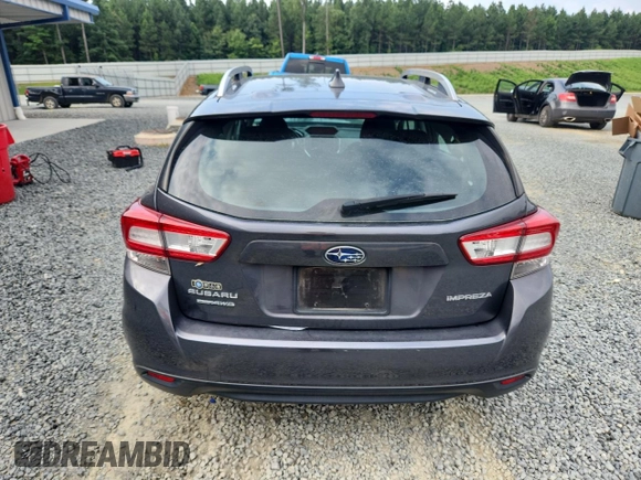 2018 Subaru Impreza Premium with VIN 4S3GTAD64J3715454, listed as a Copart auction lot 64798345 with 63,467 mi miles and Salvage title. Bid and sale history available at DreamBid. Image 6.