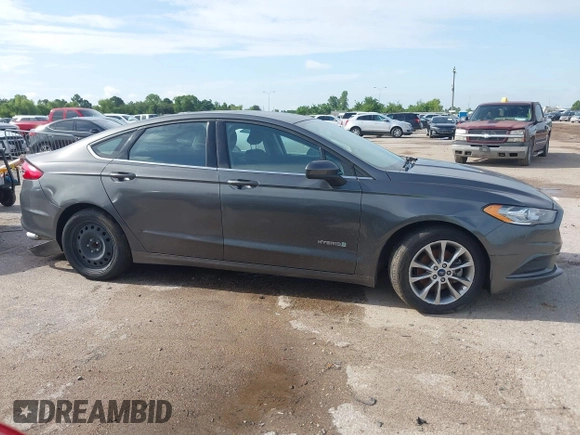 2017 Ford Fusion Hybrid SE with VIN 3FA6P0LU5HR336779, listed as a IAAI auction lot 42691789 with 140,720 mi miles and . Bid and sale history available at DreamBid. Image 13.