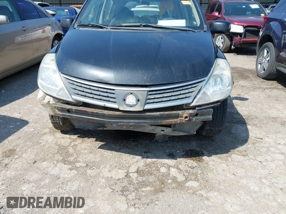 2009 Nissan Versa 1.8 S with VIN 3N1BC13E59L499006, listed as a IAAI auction lot 41953194 with 179,330 mi miles. Bid and sale history available at carsss.com. Image 6.