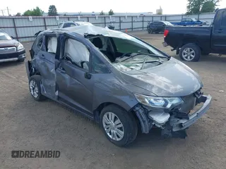 2015 Honda Fit LX with VIN 3HGGK5H54FM714873, listed as a IAAI auction lot 40088297 with 95,367 mi miles and . Bid and sale history available at DreamBid. Image 1.