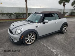 2013 MINI Convertible S with VIN WMWZP3C58DT705660, listed as a Copart auction lot 87691205 with 123,106 mi miles and Clean Title. Bid and sale history available at DreamBid. Image 1.