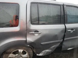 2013 Honda Pilot EX-L z VIN 5FNYF4H53DB072245, wystawiony jako Copart lot #56153435 z przebiegiem Nie podano mil oraz Szkoda całkowita • Salvage title. Historia ofert i sprzedaży dostępna na DreamBid. Obrazek 11.