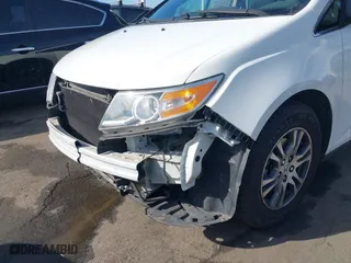 2011 Honda Odyssey EX-L with VIN 5FNRL5H67BB007777, listed as a IAAI auction lot 41402903 with 210,921 mi miles. Bid and sale history available at carsss.com. Image 6.