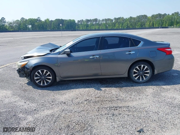 2016 Nissan Altima 2.5 SR with VIN 1N4AL3AP3GC186902, listed as a IAAI auction lot 39780328 with 142,952 mi miles. Bid and sale history available at carsss.com. Image 14.