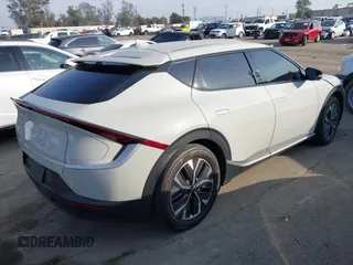 2024 Kia EV6 Wind with VIN KNDC3DLC9R5615468, listed as a IAAI auction lot 41459807 with 22,159 mi miles. Bid and sale history available at carsss.com. Image 4.