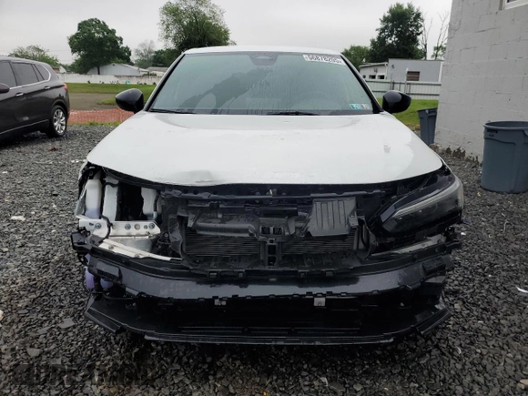 2023 Honda Civic Sport z VIN 19XFL2H88PE023552, wystawiony jako Copart lot #56878205 z przebiegiem 23 714 mil mil oraz Szkoda całkowita • Salvage title. Historia ofert i sprzedaży dostępna na DreamBid. Obrazek 5.