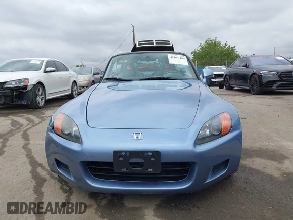 2003 Honda S2000 z VIN JHMAP11423T006018, wystawiony jako IAAI lot #42057260 z przebiegiem 117 340 mil mil oraz . Historia ofert i sprzedaży dostępna na DreamBid. Obrazek 12.