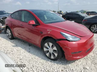 2021 Tesla Model Y Standard Range with VIN 5YJYGDED5MF116562, listed as a Copart auction lot 51211535 with 68,549 mi miles and Salvage Title. Bid and sale history available at DreamBid. Image 4.