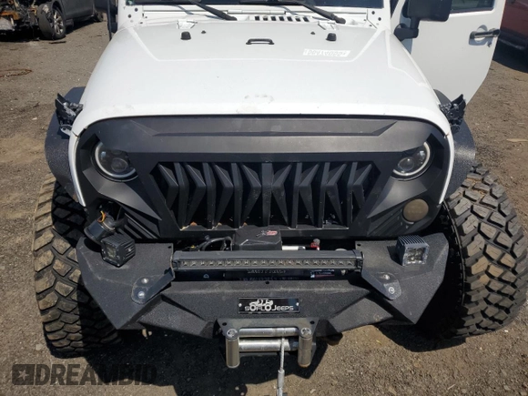 2013 Jeep Wrangler Unlimited Rubicon with VIN 1C4HJWFG2DL549064, listed as a Copart auction lot 56474055 with 148,217 mi miles and Salvage title. Bid and sale history available at DreamBid. Image 11.