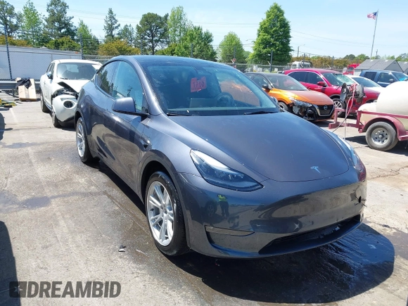 2023 Tesla Model Y Long Range with VIN 7SAYGDEE5PF882582, listed as a IAAI auction lot 42059015 with 10,567 mi miles and . Bid and sale history available at carsss.com. Image 1.
