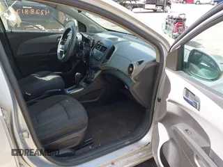 2012 Chevrolet Sonic LT z VIN 1G1JC5SH9C4112989, wystawiony jako IAAI lot #42288130 z przebiegiem 170 658 mil mil oraz . Historia ofert i sprzedaży dostępna na DreamBid. Obrazek 5.