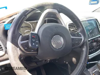 2020 Jeep Grand Cherokee Laredo E with VIN 1C4RJFAGXLC178892, listed as a IAAI auction lot 41998211 with 83,022 mi miles and . Bid and sale history available at DreamBid. Image 11.