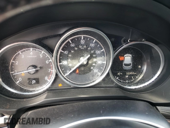 2018 Mazda CX-5 Grand Touring z VIN JM3KFBDM4J0300519, wystawiony jako Copart lot #51548745 z przebiegiem 102 853 mil mil oraz Szkoda całkowita • Salvage title. Historia ofert i sprzedaży dostępna na DreamBid. Obrazek 9.