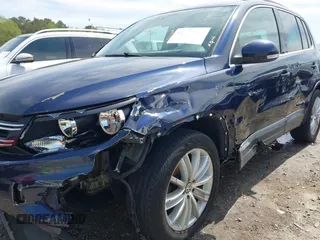 2012 Volkswagen Tiguan S with VIN WVGBV7AX3CW571039, listed as a IAAI auction lot 41928361 with 165,938 mi miles and . Bid and sale history available at DreamBid. Image 6.