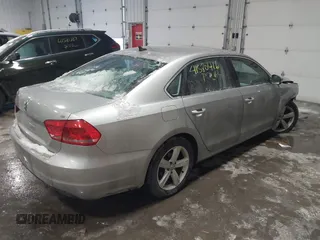 2013 Volkswagen Passat SE w/Sunroof & Nav with VIN 1VWBP7A30DC150018, listed as a IAAI auction lot 41580416 with 75,231 mi miles. Bid and sale history available at carsss.com. Image 4.