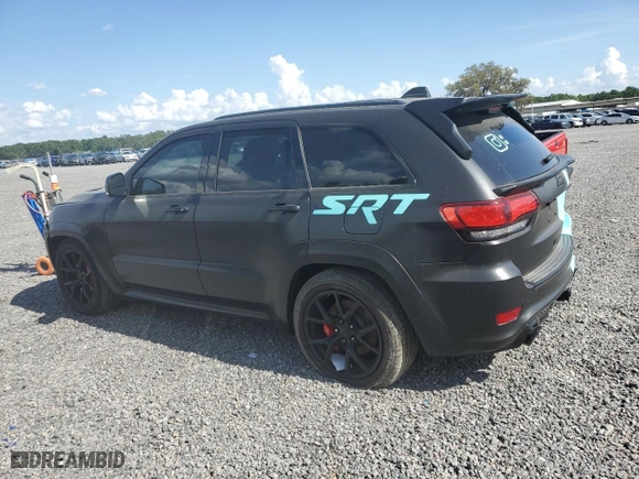 2015 Jeep Grand Cherokee SRT with VIN 1C4RJFDJXFC861588, listed as a Copart auction lot 51301235 with 35,927 mi miles and Clean Title. Bid and sale history available at carsss.com. Image 2.