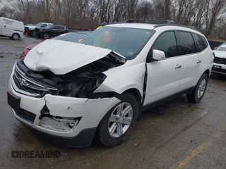 2013 Chevrolet Traverse LT with VIN 1GNKVGKD7DJ176487, listed as a IAAI auction lot 41211283 with 146,844 mi miles and . Bid and sale history available at DreamBid. Image 2.