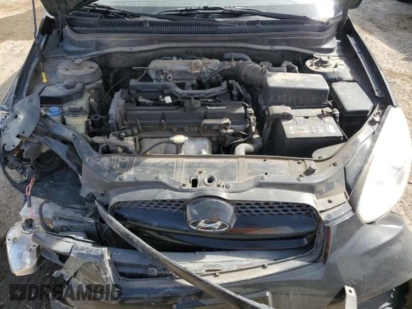 2010 Hyundai Accent GS z VIN KMHCM3AC7AU173953, wystawiony jako Copart lot #51433465 z przebiegiem 176 462 mil mil oraz Szkoda całkowita • Salvage title. Historia ofert i sprzedaży dostępna na DreamBid. Obrazek 11.