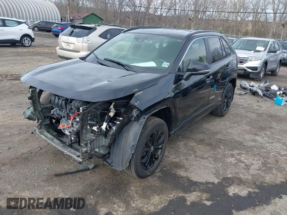 2024 Toyota RAV4 Hybrid SE with VIN JTM16RFV0RD118873, listed as a IAAI auction lot 42039019 with 7,532 mi miles and . Bid and sale history available at DreamBid. Image 2.