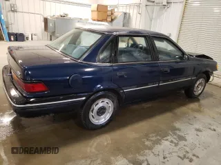 1989 Ford Tempo z VIN 1FAPP39S9KK110154, wystawiony jako Copart lot #89189355 z przebiegiem 48 949 mil mil oraz Szkody całkowita. Historia ofert i sprzedaży dostępna na DreamBid. Obrazek 3.