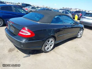 2005 Mercedes-Benz CLK-Class 5.0L with VIN WDBTK75G25T045788, listed as a IAAI auction lot 41818924 with 163,929 mi miles. Bid and sale history available at carsss.com. Image 4.