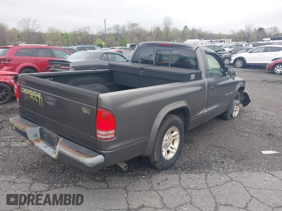 2002 Dodge Dakota with VIN 1B7FL16X62S683972, listed as a IAAI auction lot 41972271 with 158,436 mi miles and . Bid and sale history available at carsss.com. Image 4.