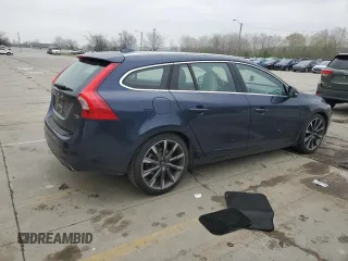 2015 Volvo V60 T5 Drive-E Premier Plus z VIN YV140MEC6F1213575, wystawiony jako Copart lot #52224865 z przebiegiem 78 702 mil mil oraz Szkoda całkowita • Salvage title. Historia ofert i sprzedaży dostępna na DreamBid. Obrazek 3.