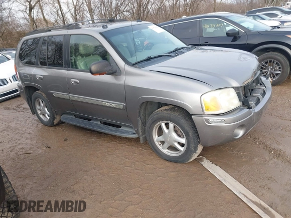 2005 GMC Envoy SLT with VIN 1GKDT13S752276414, listed as a IAAI auction lot 41052684 with 200,919 mi miles. Bid and sale history available at carsss.com. Image 1.