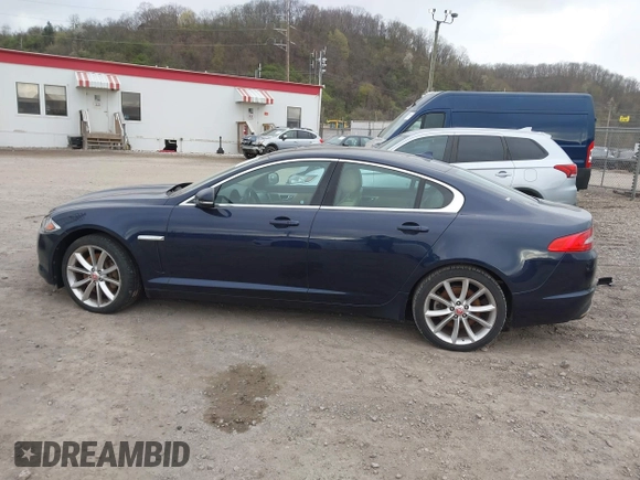2015 Jaguar XF V6 Portfolio with VIN SAJWJ0FF5F8U67140, listed as a IAAI auction lot 41967522 with 68,000 mi miles. Bid and sale history available at carsss.com. Image 15.