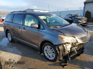 2011 Toyota Sienna XLE AAS with VIN 5TDYK3DC1BS170855, listed as a Copart auction lot 86829904 with 142,117 mi miles and Salvage Title. Bid and sale history available at carsss.com. Image 4.