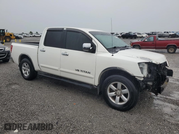 2010 Nissan Titan SE with VIN 1N6BA0ED7AN324632, listed as a Copart auction lot 57095185 with 156,391 mi miles and Salvage title. Bid and sale history available at DreamBid. Image 4.