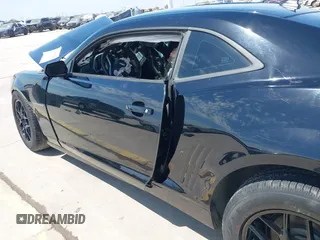 2014 Chevrolet Camaro LS z VIN 2G1FA1E32E9126043, wystawiony jako IAAI lot #42253189 z przebiegiem 104 457 mil mil oraz . Historia ofert i sprzedaży dostępna na DreamBid. Obrazek 20.