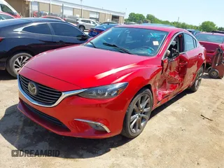 2016 Mazda 6 i Grand Touring с VIN JM1GJ1W53G1437385, выставлен на аукционе IAAI как лот 42249660 с пробегом 57 982 миль миль и . История ставок и продаж доступна на DreamBid. Изображение 17.