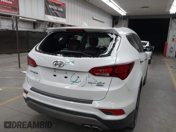 2017 Hyundai Santa Fe Ultimate with VIN 5NMZW4LA0HH040141, listed as a IAAI auction lot 42603243 with 140,817 mi miles and . Bid and sale history available at DreamBid. Image 6.