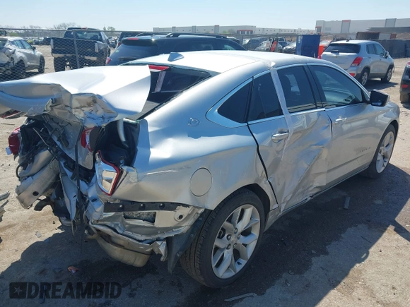 2014 Chevrolet Impala LT with VIN 2G1125S35E9102161, listed as a IAAI auction lot 41976891 with 129,408 mi miles and . Bid and sale history available at DreamBid. Image 4.