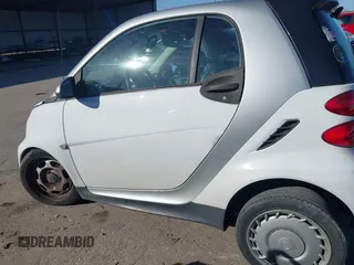 2015 Smart fortwo Passion z VIN WMEEJ3BA4FK788712, wystawiony jako IAAI lot #41219852 z przebiegiem 52 243 mil mil oraz . Historia ofert i sprzedaży dostępna na DreamBid. Obrazek 15.