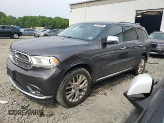 2015 Dodge Durango Citadel with VIN 1C4RDJEG3FC947113, listed as a Copart auction lot 59779965 with 185,202 mi miles and Salvage title. Bid and sale history available at DreamBid. Image 1.