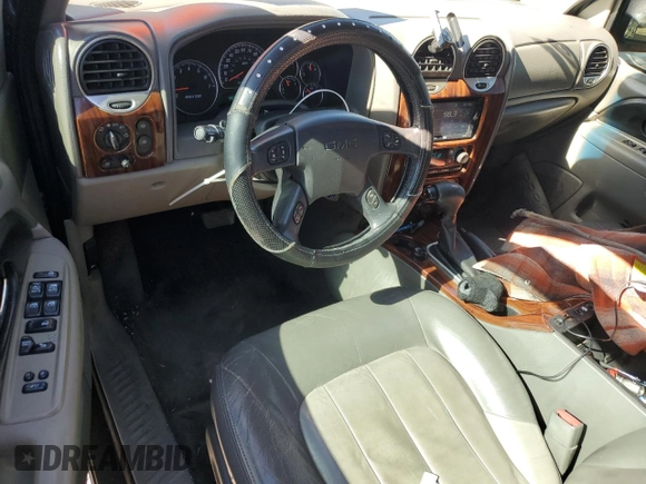 2003 GMC Envoy SLT z VIN 1GKET16S436169701, wystawiony jako Copart lot #44390805 z przebiegiem 168 236 mil mil oraz Szkoda całkowita • Salvage title. Historia ofert i sprzedaży dostępna na DreamBid. Obrazek 8.