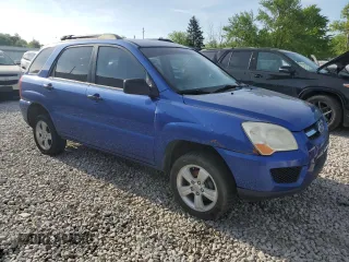 2010 Kia Sportage LX z VIN KNDKG3A46A7722489, wystawiony jako Copart lot #57530485 z przebiegiem 258 368 mil mil oraz Czysty tytuł • Clean title. Historia ofert i sprzedaży dostępna na DreamBid. Obrazek 4.