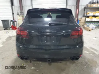 2012 Porsche Cayenne Turbo z VIN WP1AC2A21CLA84144, wystawiony jako Copart lot #82688294 z przebiegiem 124 143 mil mil oraz Szkoda całkowita • Salvage title. Historia ofert i sprzedaży dostępna na DreamBid. Obrazek 6.