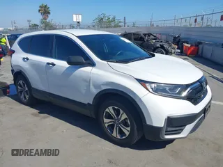 2020 Honda CR-V LX with VIN 7FARW1H21LE000603, listed as a IAAI auction lot 42494710 with 119,929 mi miles and . Bid and sale history available at DreamBid. Image 1.