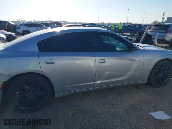 2021 Dodge Charger SXT with VIN 2C3CDXBG0MH562538, listed as a IAAI auction lot 41877128 with 54,934 mi miles and . Bid and sale history available at DreamBid. Image 13.