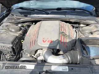 2014 Dodge Challenger R/T Plus z VIN 2C3CDYBT1EH201887, wystawiony jako IAAI lot #42225211 z przebiegiem 278 574 mil mil oraz . Historia ofert i sprzedaży dostępna na DreamBid. Obrazek 10.