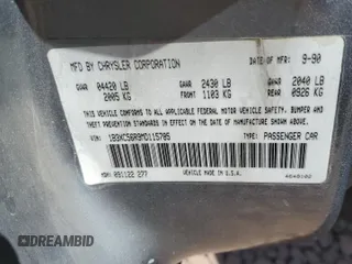 1991 Dodge Dynasty LE z VIN 1B3XC56R9MD115785, wystawiony jako Copart lot #48073715 z przebiegiem 64 483 mil mil oraz Szkoda całkowita • Salvage title. Historia ofert i sprzedaży dostępna na DreamBid. Obrazek 12.